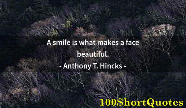 Quote by Albert Einstein: A smile is what makes a face beautiful.